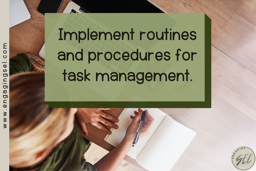 Woman using a to do list and writing at her desk next to a computer. 