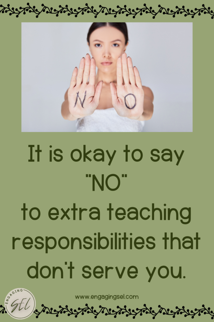 Person holding their hands out in front of them with the writing NO on their hands 